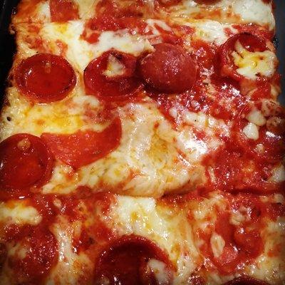 Detroit pie with pepperoni and mikes hot honey.