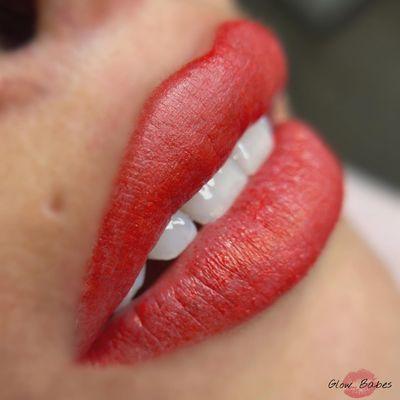 Semi permanent red lips requested by client!! Beautiful!!