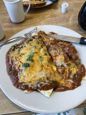 Huevos Rancheros and my husband ordered hamburger steak and eggs but he ate it so fast I couldn't get a photo lol