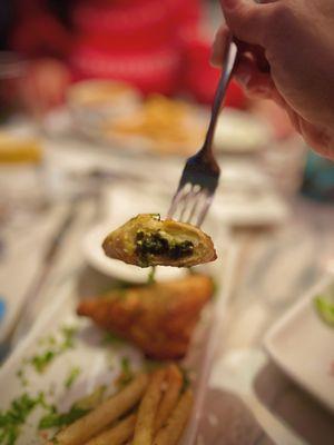 Inside the Spanakopita- ample filling and nice texture but too bland for me.