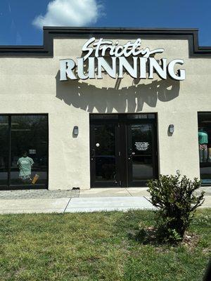 Front of the store with reasonable street parking.