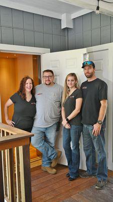 Corey (far left), Michael, Amber & Johnny, in front of Cambridge Elevator featuring automatic opening gate and flush mount lock.