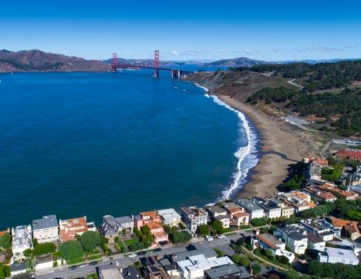 San Francisco neighborhood with Golden Gate Bridge in the background.