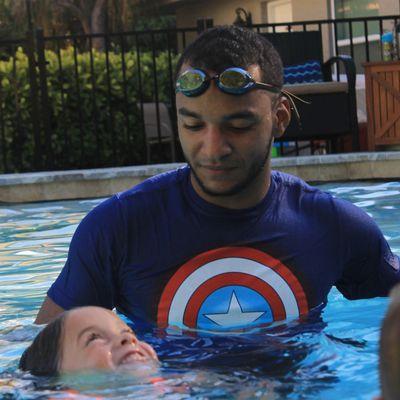 Coach Ethienne teaching this young Cadet how to keep her head up while treading water!