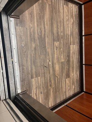 Filthy and sticky floors in elevator also missing ceiling tiles