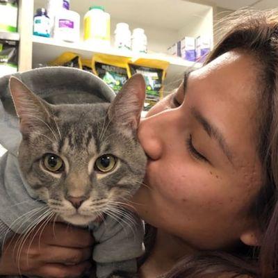 Our practice manager, Jackie, and her cat