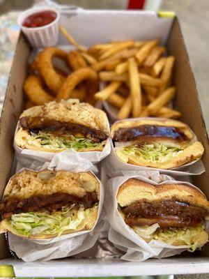 Local girl burger (left), teriyaki burger (right), fries and onion rings