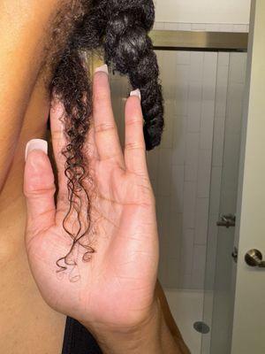 this is my hair now with heat damage. I only left this part of my hair out in the back to show the damage but you get the point.