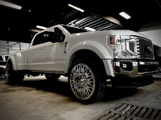 Ford F-450: Overnight full detail with wheels polished to perfection.