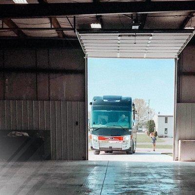 An RV pulling up to our shop to have new Diamond Shield Paint Protection Film installed.