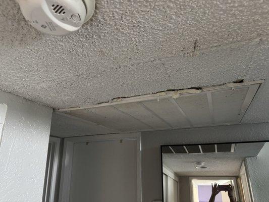 The ceiling is caving in and the water leaks from up here anytime the air conditioner is on