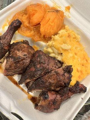 Dark chicken was deliciously flavored. A bit dry but delicious. Yams were the bomb mixed Mac and cheese