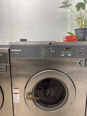 Large washer $5/load but it's displaying E: dr and I can not open the door to get my clothes out