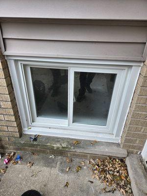 Sliding window with frosted glass.