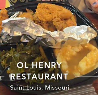 Fried chicken wings, greens, mashed potatoes and gravy.