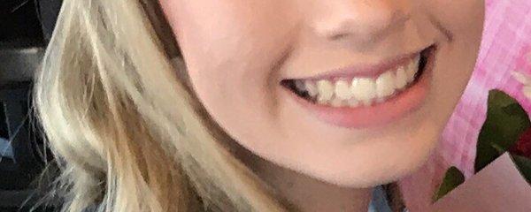 A "thank you Dr. Tang" smile.