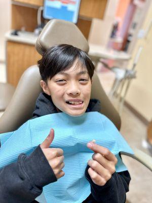 When you've been waiting for months and that baby tooth won't come out