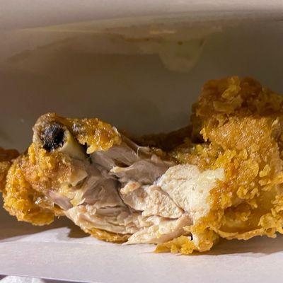 There's a view of that juicy perfectly cooked chicken under that corating