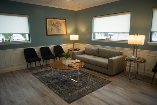 Comfortable waiting room equipped with a beverage center so you can enjoy a cup of coffee while you wait!