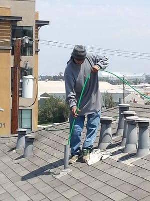 Hydro Jetting from roof vent in apartment building