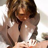 Carly Kirby BSN, RN, LAc and Diplomate of Oriental Medicine & Herbology.