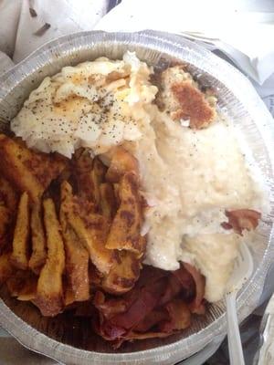 French Toast, bacon, egg whites with cheese, cheese grits, and last but not least, a piece of salmon cake.