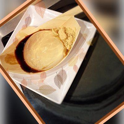 Raindrop cake: like flan without the flavor or milky consistency. The dark syrup was Carmel like and the powdery stuff had little flavor.