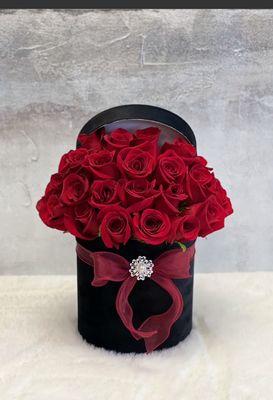 Hat box of red roses