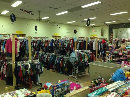 Here's a pic of our last fall/winter sale. Clothing is neatly hung and organized by size and gender.