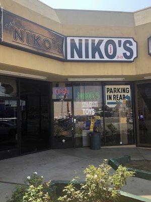 The front of the store located inside of a plaza