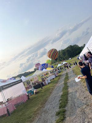 Pop up stands Vendors Food trucks Hot air balloons Live stage