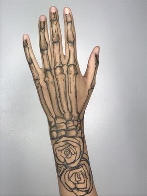 Skeleton hand and roses, using our organic fruit based ink