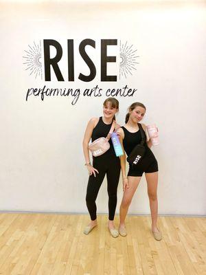 Our dancers showing off their new RISE swag in Studio B
