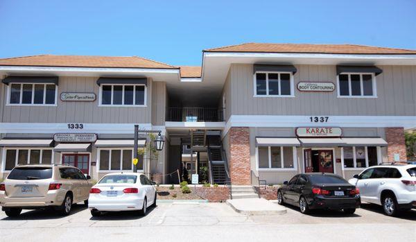 We're located on the second floor, Suite 210!