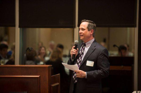 Dr. Carter speaking at Brighter Smiles for Brighter Futures