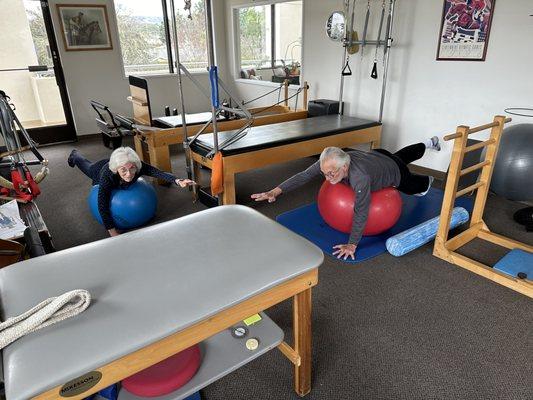Home exercises using a physio ball for posture , balance and pain relief