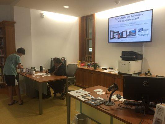 The check out desk in the teen section of the library