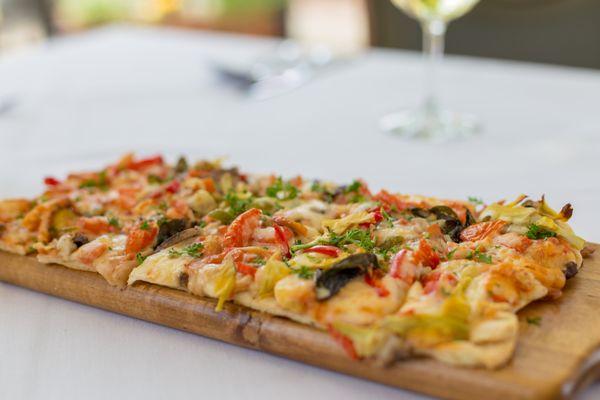 Chef prepares hors d'oeuvres for Happy Hour.