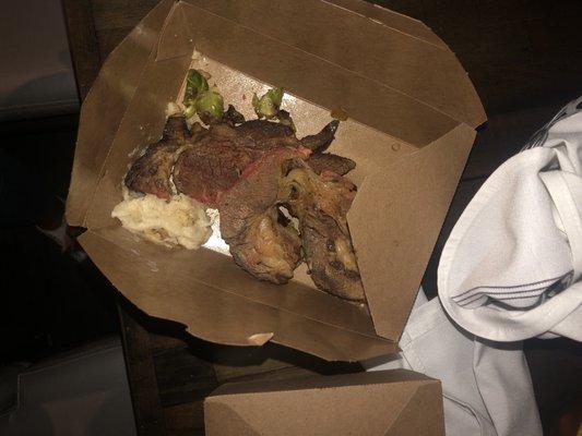 Boxed up steak that the chef ate off of according to the manager.
