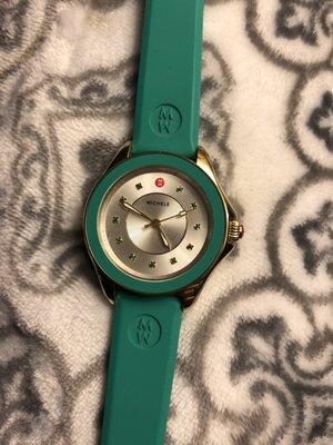 Michele stainless steel back, 11 gem stones. Love the band!