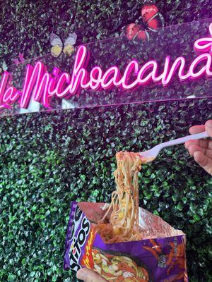 Crazy ramen: Hot sauce ,mayo, nacho cheese, cotija cheese and ramen.