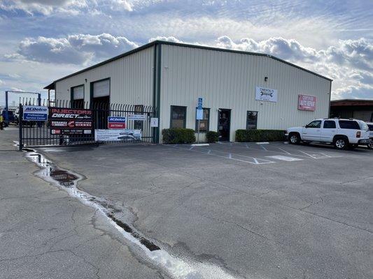 Entry into shop parking lot.