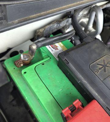 Picture of Drywall screw taken out of drywall to tighten the negative cable since the clamp screw was rusty.