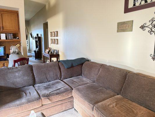 Before. The cushions are shot.....completely sink in when you sit and cushion covers wrinkled