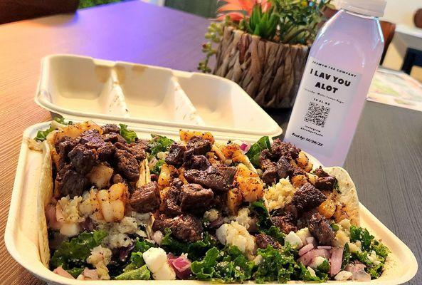 Mixed drink and taco meal