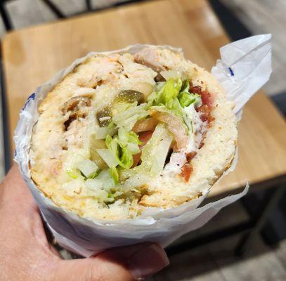 Chicken and Swiss on white bread. Bacon was ~$2