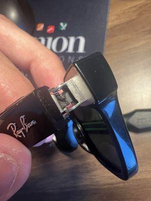 This shows the wires that run through the hinge that they damaged using an incorrect screw to replace a missing one.