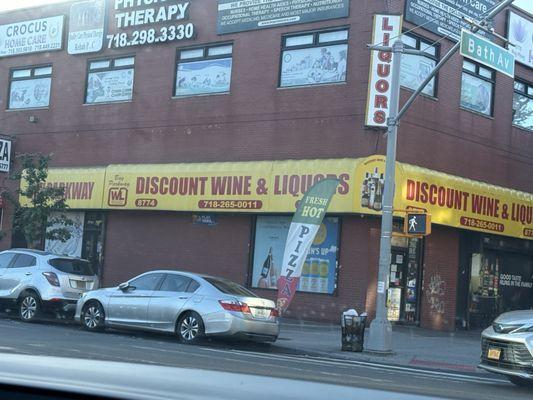 Next to liquor store same address