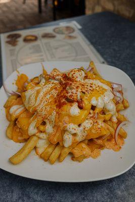 Cheesy loaded fries with shawarma meat