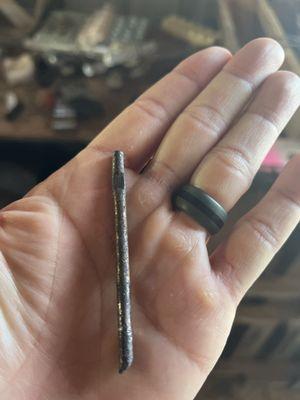 Huge screwdriver piece stuck in my tire that Leo identified and removed!